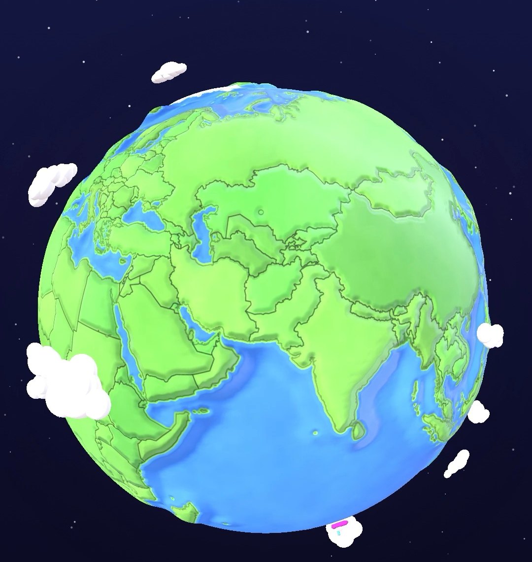 A clay globe under a night sky, with little clouds drifting around it